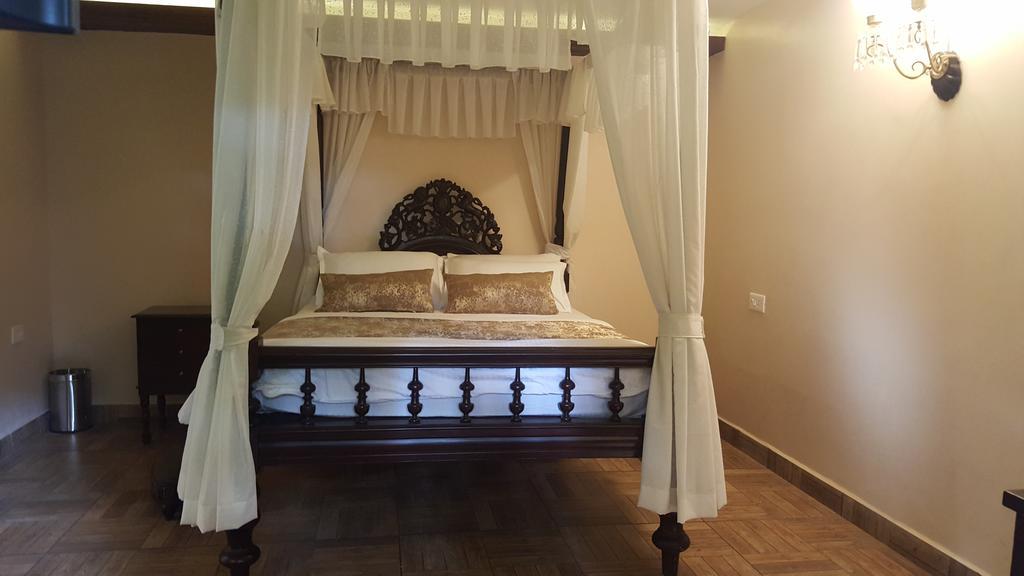 Casa Menezes - A Heritage Goan Homestay แบมโบลิม ห้อง รูปภาพ